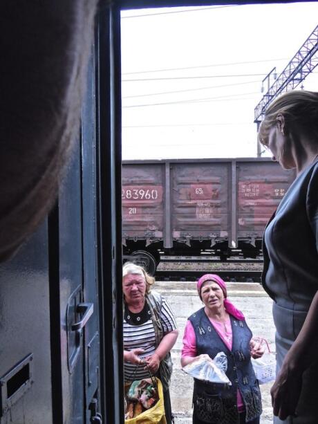 Babushkas selling home made produce at most stops