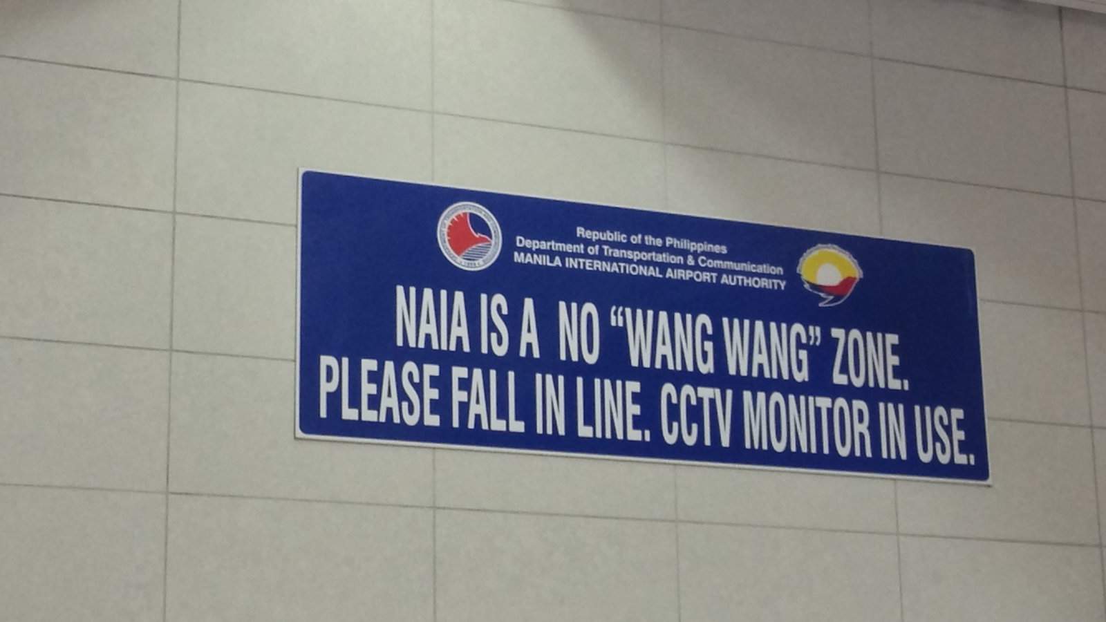 While it may seem to be something naughty, a "no wang wang" sign in Malaysia means don't cute the queue!