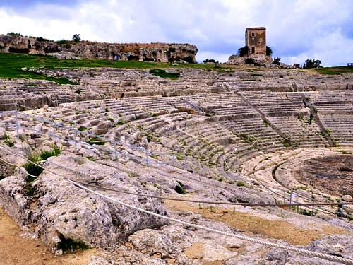 The Greek Theatre ruins at Syracuse are a romantic spot to explore in Sicily