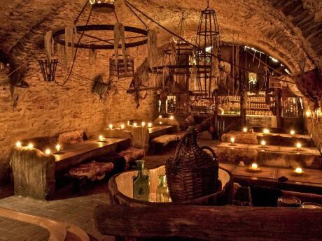 Gay dining in Prague - a medieval dinner in a tavern is an awesome foodie experience.