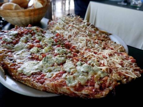 A fish pizza - boga fish specialty at the famous Escauriza Restaurant in Rosario