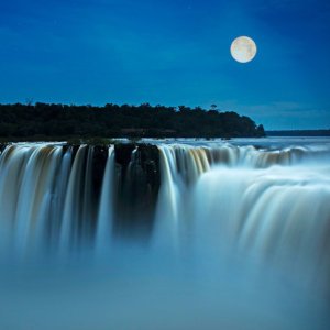 One of the most romantic ways to visit Iguazu Falls is under the light of a full moon.