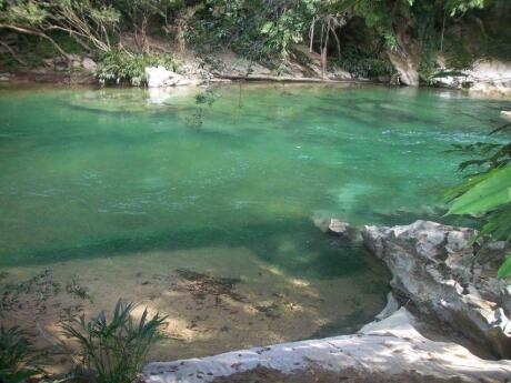 Day trips from Medellin - the Rio Claro nature reserve features crystal clear waters and lots of native wildlife.