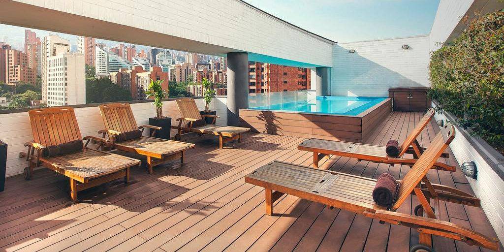 Gay hotels in Medellin - the rooftop pool and lounging area is just one of the pretty features of Medellin's Sites Hotel