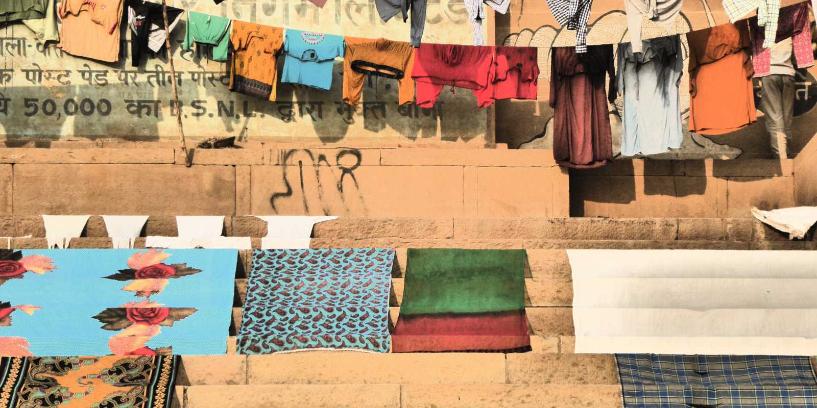 Many locals use the Ganges to wash laundry, which looks very pretty drying beside the river