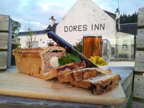 For traditional Scottish food in a gorgeous spot, the Dores Inn beside Loch Ness is a beautiful little pub