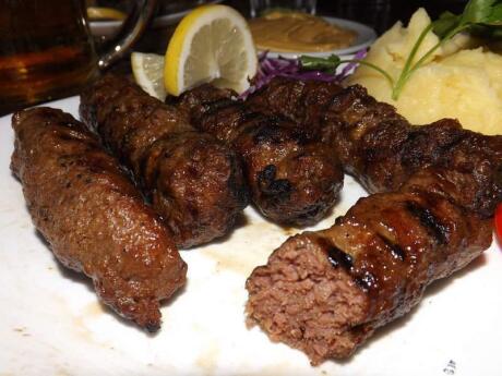 Mici is a delicious type of sausage from Romania that goes perfectly with some beers