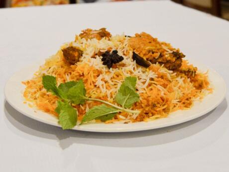 Instead of curry with rice, Biryani from India is made by cooking curry and rice separately then cooking them again together