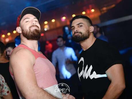 Bears posing in gay Bar club Burdel in Santiago