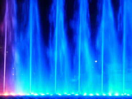 Blue fountain jets during the magic water fountain show in lima