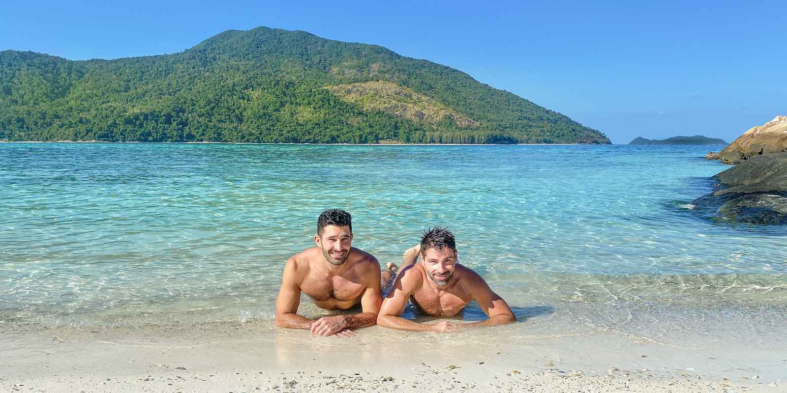 Nomadic Boys Stefan and Sebastien posing on one of the many beautiful gay beaches in Phuket