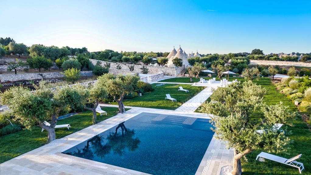 Trullo Incanto D'Itria offers sheer luxury in the Italian countryside, perfect for a group of gay travellers holidaying together!