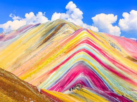 The incredible multi-colored layers in Peru's rainbow mountain make it an unforgettable place to visit