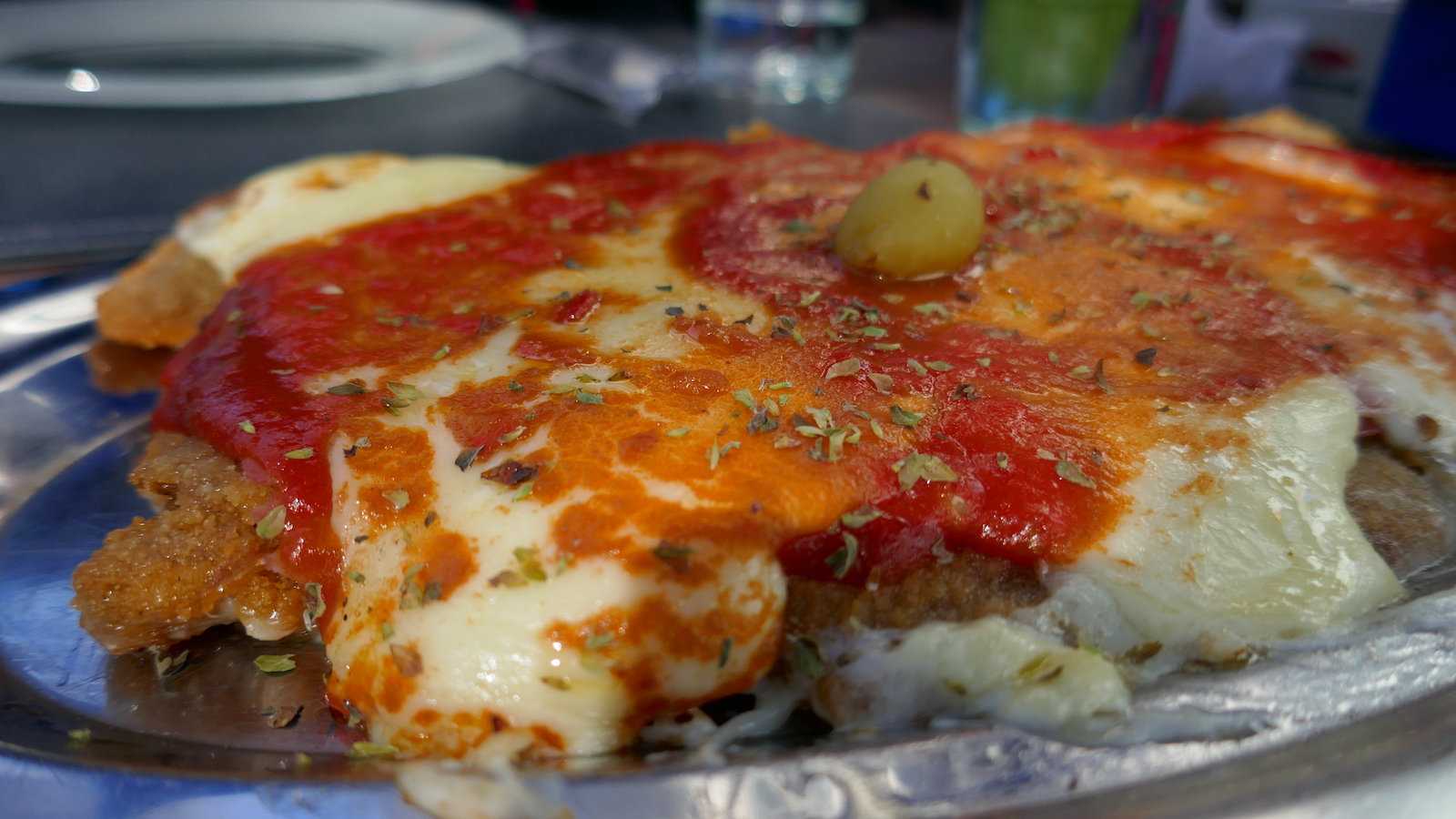 Milanesa a la Napolitana is one of the best traditional foods of Argentina