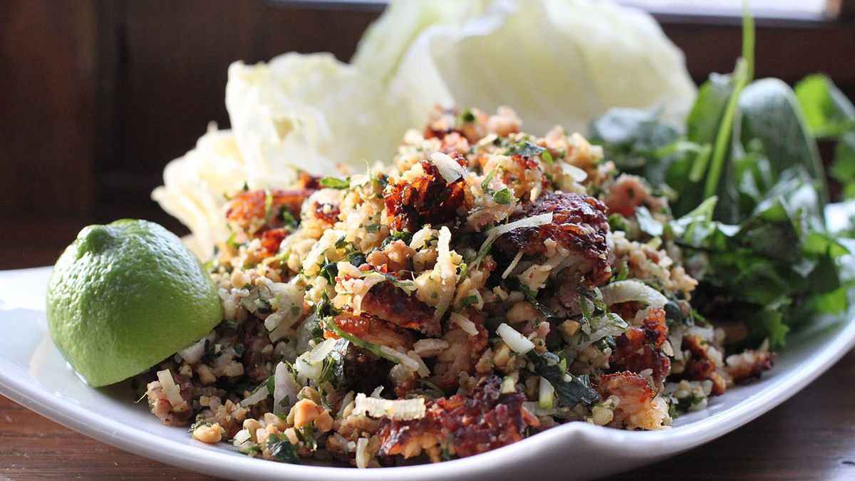 Nam khao is a crispy rice salad from Laos that you can get at street food stalls