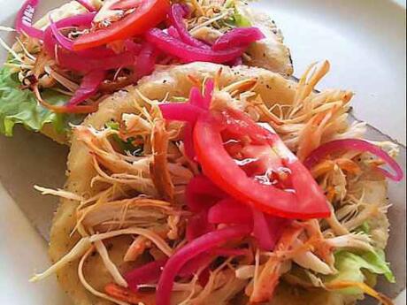 Salbutes are corn tortillas fried with yummy toppings