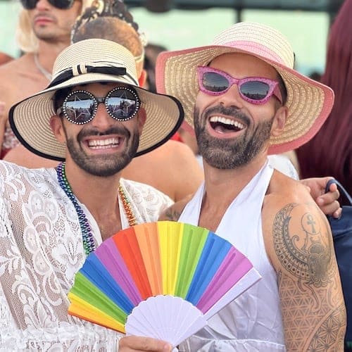 Stefan and Sebastien from Nomadic Boys with rainbow fan.