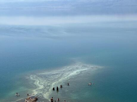 People walking the Dead Sea in Amman in Jordan