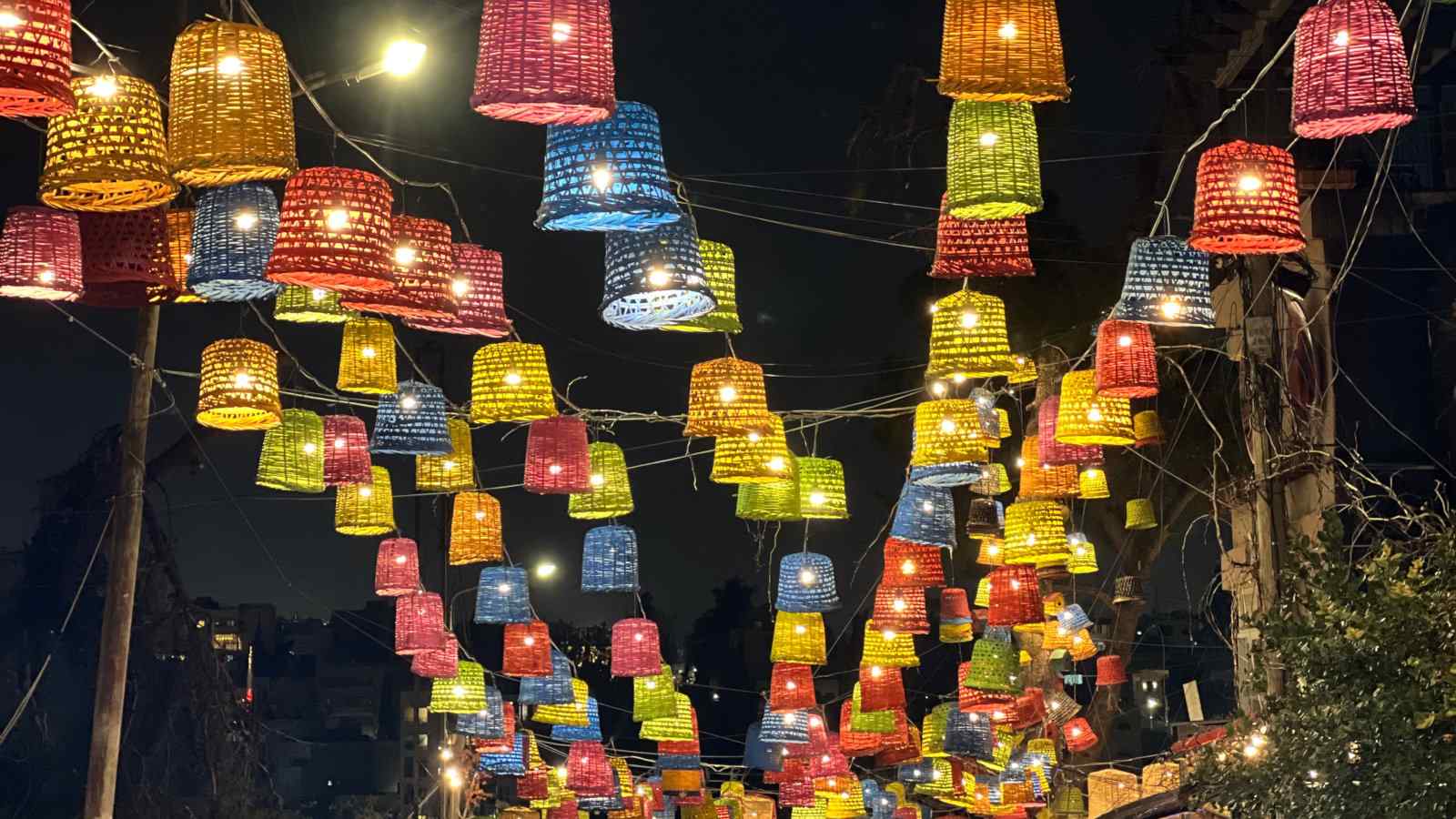 Strings of rainbow lights hanging above a Rainbow streets in Amman in Jordan.